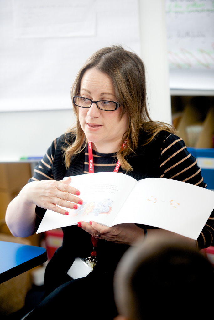 Teacher reading to pupils