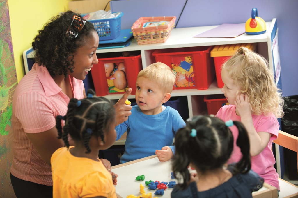 Teacher with pre-school children