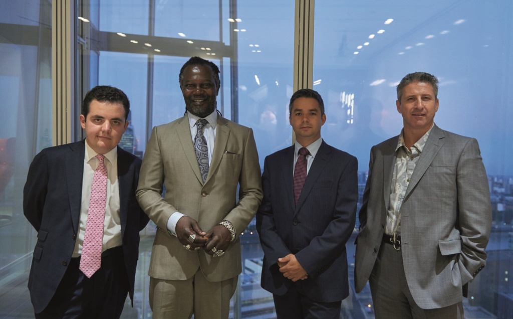 Ollie Forsyth with Levi Roots and 2 others