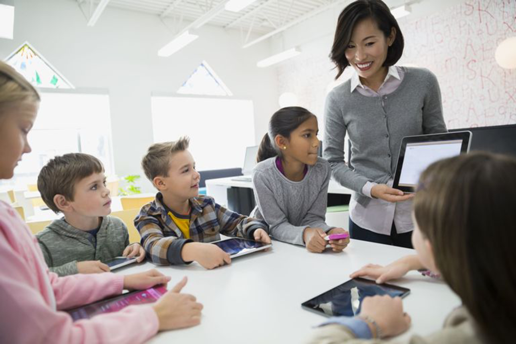 Teacher with young pupils