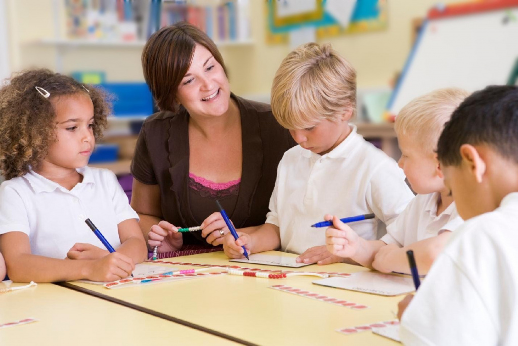 teacher with nursery children