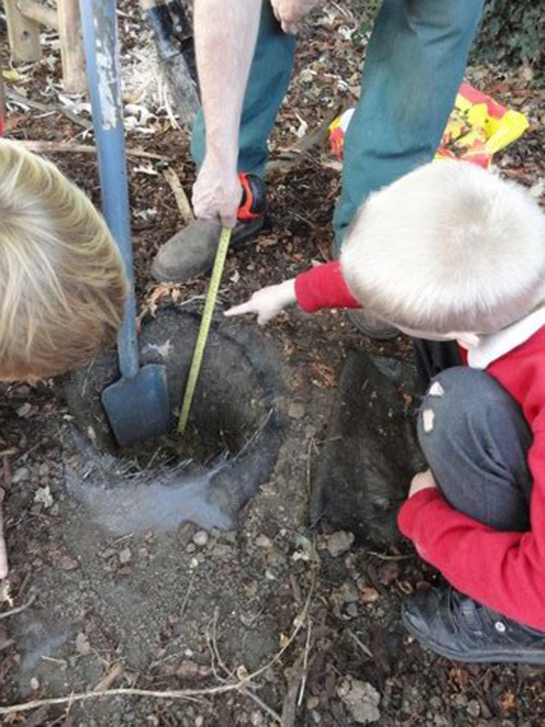 Kids digging a hole