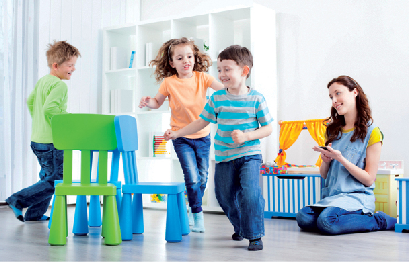 young children playing musical chairs