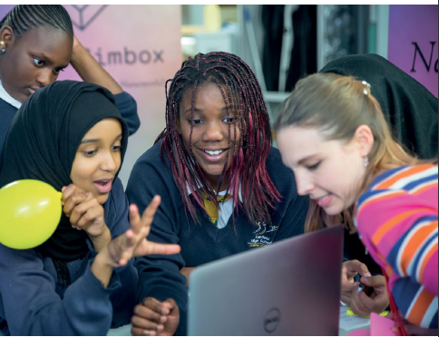 Girls looking at the computer modelling at Nano Simbox offices