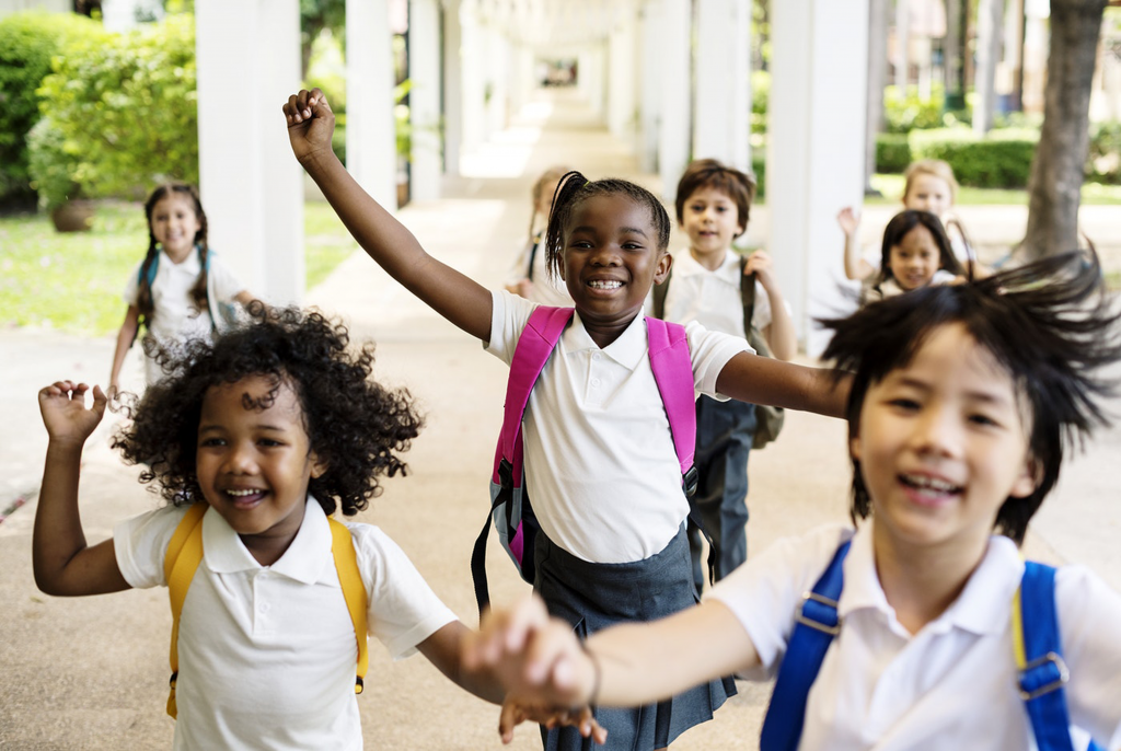 Happy young school children