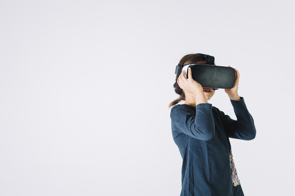 Young girl with VR headset