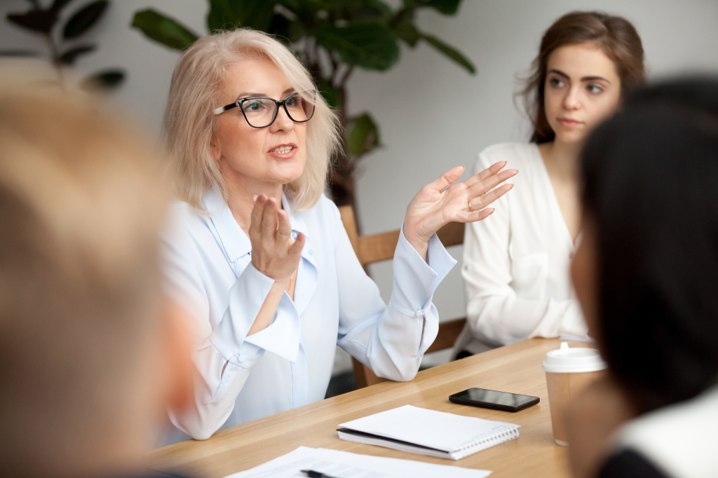 Leader speaks to her collegues