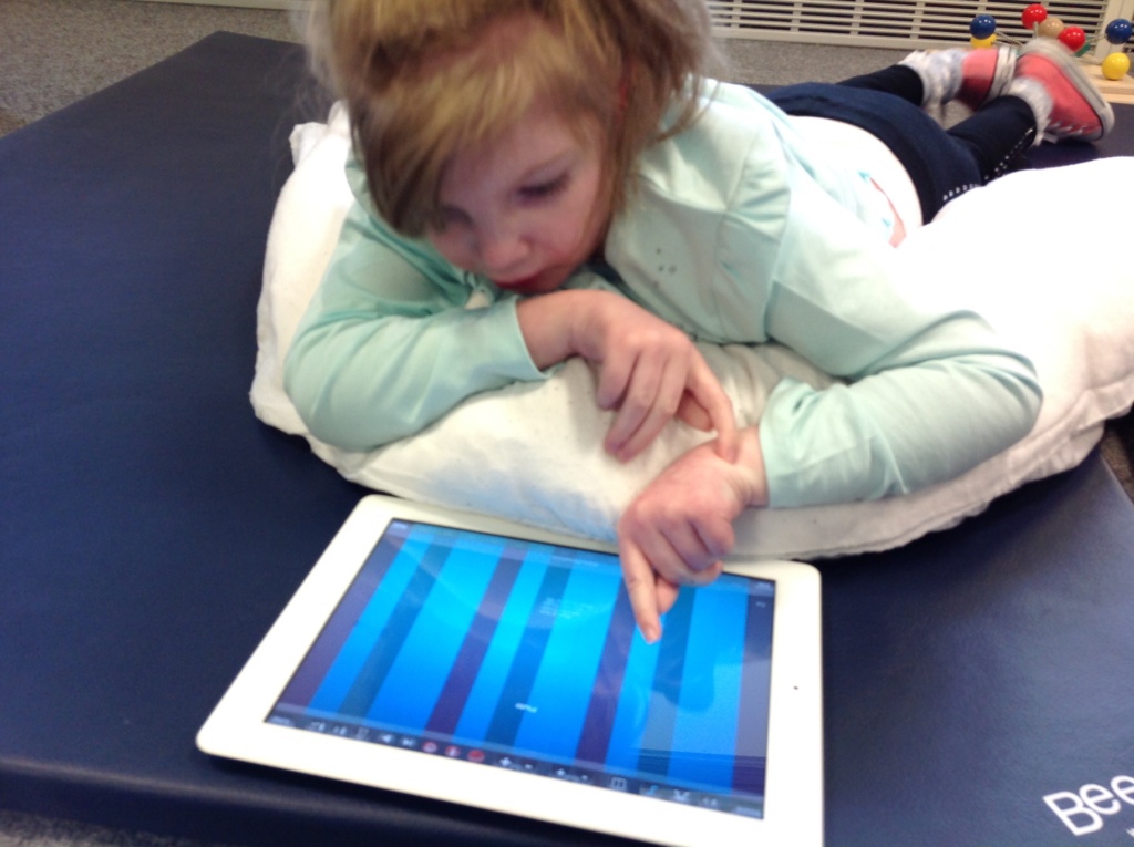 Special needs pupil with tablet