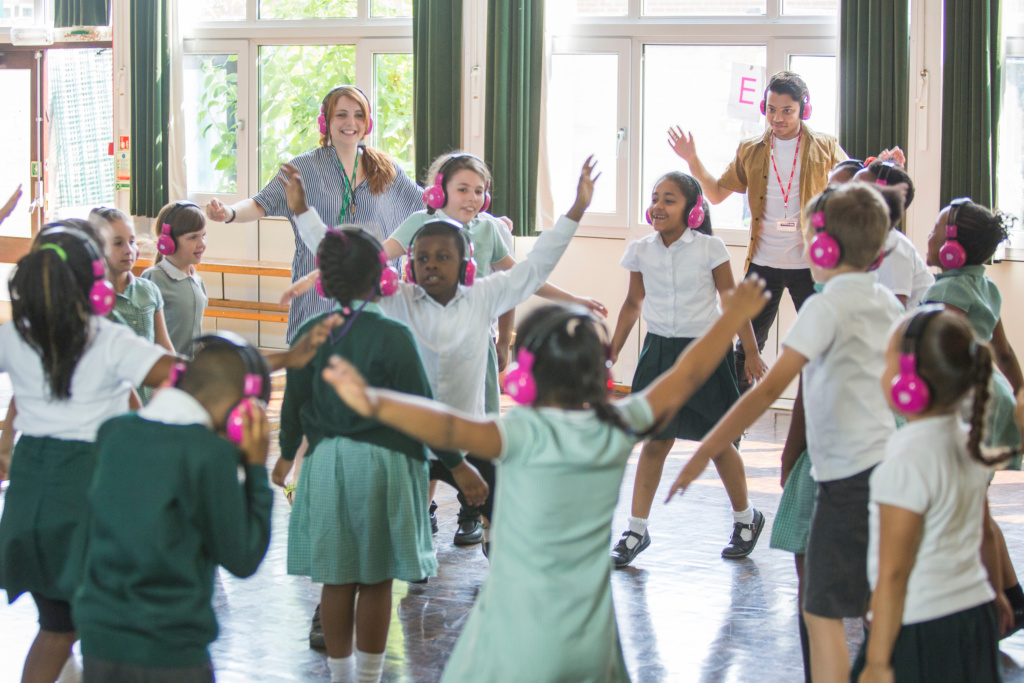 Primary aged children in a circle