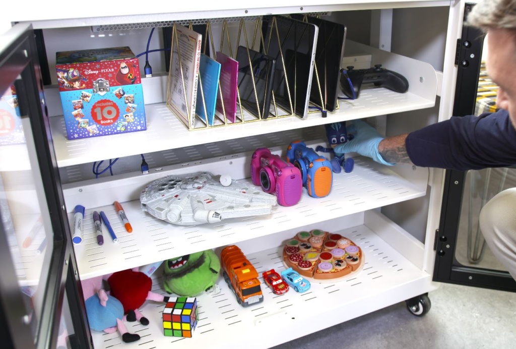 A set of shelves with toys to bedisinfected