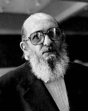 Headshot of author and educator Paulo Freire in black and white.