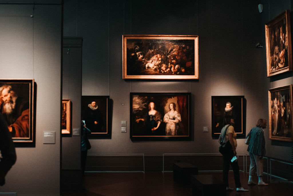 Visitors on a trip to a classical art gallery