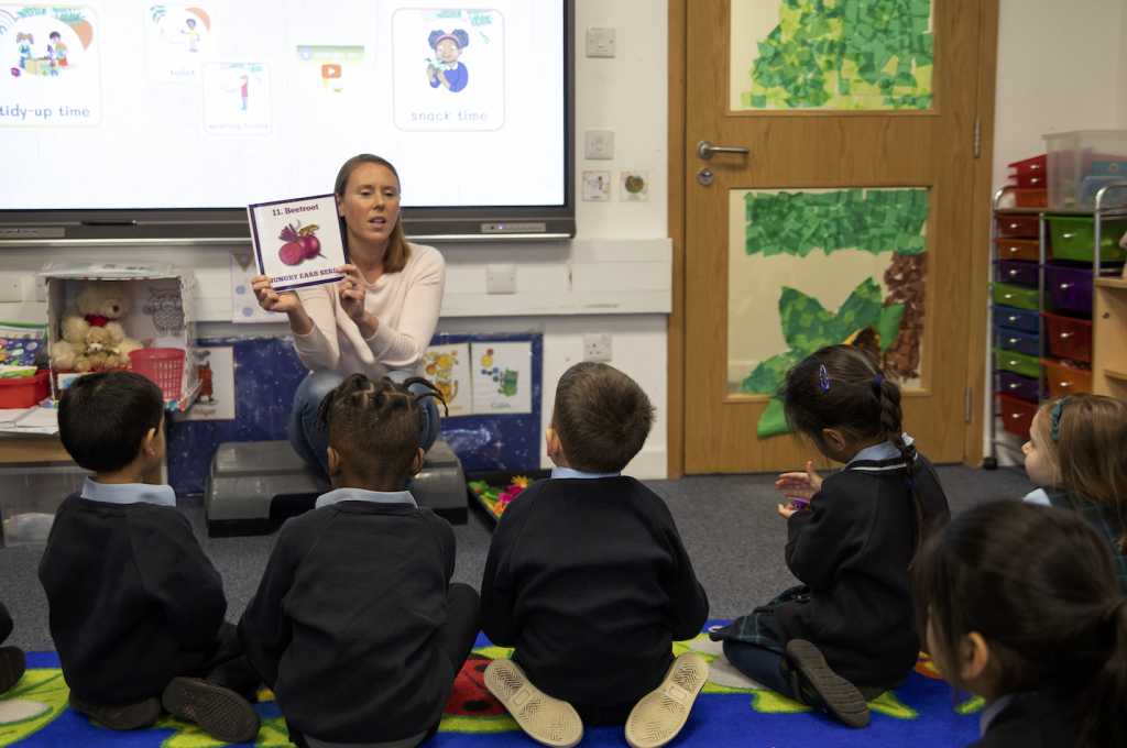 Nutritionist teaching primary school (Reception) children about beetroot